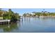 Tranquil waterway view with lush landscaping at 1703 N Tamiami Trl # 209, Sarasota, FL 34234