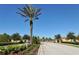 Gated community entrance with landscaping at 20361 Pezzana Dr, Venice, FL 34292