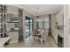 Breakfast nook features backyard views and seamlessly connects to the kitchen and outdoor living area at 20686 Valprato Ct, Venice, FL 34293