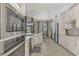 View of the gourmet kitchen featuring stainless steel appliances and a dining area with backyard view at 20686 Valprato Ct, Venice, FL 34293