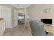 Comfortable home office with open views to the kitchen, perfect for working from home at 20686 Valprato Ct, Venice, FL 34293