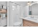 Clean bathroom with shower and wood vanity at 2226 Arlington St, Sarasota, FL 34239