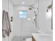 Clean bathroom with walk-in shower and updated fixtures at 2226 Arlington St, Sarasota, FL 34239