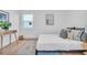 Serene bedroom with light walls, stylish decor, and natural light at 2226 Arlington St, Sarasota, FL 34239