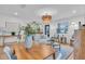 Bright dining room with hardwood floors and a view into the kitchen at 2226 Arlington St, Sarasota, FL 34239