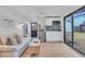 Studio living space with sofa, kitchenette, and sliding doors at 2226 Arlington St, Sarasota, FL 34239