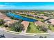 Aerial view of a lakefront community showcasing beautiful homes at 234 River Enclave Ct, Bradenton, FL 34212