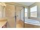 Bathroom features a shower and garden tub at 234 River Enclave Ct, Bradenton, FL 34212