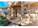 Front entryway with a beige door and lighting at 234 River Enclave Ct, Bradenton, FL 34212