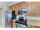 Stainless steel appliances and ample counter space in this kitchen at 234 River Enclave Ct, Bradenton, FL 34212