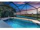 Screened pool and lanai overlooking a canal at 234 River Enclave Ct, Bradenton, FL 34212