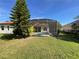 Backyard view showcasing pool and screened enclosure at 240 Dove Trl, Bradenton, FL 34212