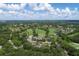 Aerial view of community, golf course, and homes at 2421 Crispin Ct # E3, Sarasota, FL 34235