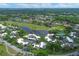 Community overview featuring golf course and lake at 2421 Crispin Ct # E3, Sarasota, FL 34235