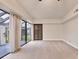 Spacious bedroom with sliding glass doors and shutters at 2421 Crispin Ct # E3, Sarasota, FL 34235