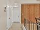 Bright condo entry with wood accent wall at 2421 Crispin Ct # E3, Sarasota, FL 34235