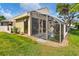 Well-maintained home with a screened patio and landscaping at 2421 Crispin Ct # E3, Sarasota, FL 34235