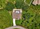 An aerial view showcasing a single-Gathering home with a large yard at 2534 Stagnaro Rd, North Port, FL 34287