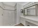 Bathroom with shower, vanity, and tiled floors at 2534 Stagnaro Rd, North Port, FL 34287