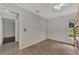 Spacious bedroom with wood flooring and access to another room at 2534 Stagnaro Rd, North Port, FL 34287