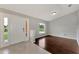 Bright entryway with wood-look flooring and neutral walls at 2534 Stagnaro Rd, North Port, FL 34287