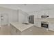 Modern kitchen featuring stainless steel appliances and an island at 2534 Stagnaro Rd, North Port, FL 34287
