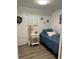 Charming bedroom with a twin bed and nautical-themed decor at 2601 Gulf N Dr # 729, Bradenton Beach, FL 34217