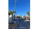 Nice community view, featuring palm trees and a paved road at 2601 Gulf N Dr # 729, Bradenton Beach, FL 34217