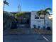 Quaint waterfront home with palm trees and a relaxing patio area at 2601 Gulf N Dr # 729, Bradenton Beach, FL 34217