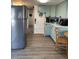 Well-equipped kitchen featuring light teal cabinets and stainless steel appliances at 2601 Gulf N Dr # 729, Bradenton Beach, FL 34217