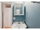 Clean bathroom with a white vanity, mirror, and a shower/tub combo at 283 Bainbridge Dr, Nokomis, FL 34275