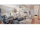 Open concept living area, showing comfortable seating and access to other rooms at 283 Bainbridge Dr, Nokomis, FL 34275