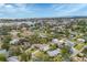 Wide aerial view of waterfront neighborhood at 305 Pameto Rd, Nokomis, FL 34275