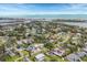 Aerial view of a residential neighborhood near the water at 305 Pameto Rd, Nokomis, FL 34275