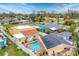 Aerial view showing house, pool, and neighborhood at 305 Pameto Rd, Nokomis, FL 34275
