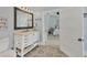 Bathroom with updated vanity and view to bedroom at 305 Pameto Rd, Nokomis, FL 34275