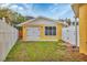 Bright detached garage with large door and window at 305 Pameto Rd, Nokomis, FL 34275