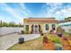 Charming yellow house with landscaped yard at 305 Pameto Rd, Nokomis, FL 34275