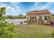 Charming house with nicely landscaped front yard at 305 Pameto Rd, Nokomis, FL 34275