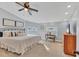 Spacious main bedroom with carpeted floor and large window at 305 Pameto Rd, Nokomis, FL 34275