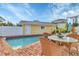 Relaxing pool area with patio furniture at 305 Pameto Rd, Nokomis, FL 34275