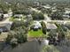 Waterfront home featuring lush landscaping, a well-manicured lawn, and beautiful surroundings in a quiet community at 3151 Johannesberg Rd, North Port, FL 34288