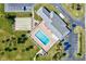 Aerial view of community pool, shuffleboard, and clubhouse at 3701 39Th W St, Bradenton, FL 34205
