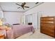 Comfortable bedroom with a double bed and built-in shelving at 3701 39Th W St, Bradenton, FL 34205