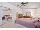 Spacious bedroom with mirrored closet and en-suite bathroom at 3701 39Th W St, Bradenton, FL 34205