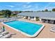 Inviting community pool with lounge chairs at 3701 39Th W St, Bradenton, FL 34205