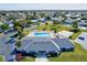 Community pool and clubhouse with surrounding landscape at 3701 39Th W St, Bradenton, FL 34205