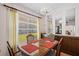 Dining area with a wood table and four chairs at 3701 39Th W St, Bradenton, FL 34205