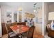 Kitchen with adjoining dining area and wood cabinets at 3701 39Th W St, Bradenton, FL 34205