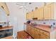 Well-equipped kitchen featuring light wood cabinets at 3701 39Th W St, Bradenton, FL 34205